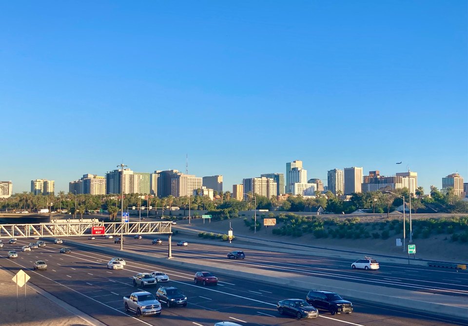 Downtown Phoenix skyline beyond the highway