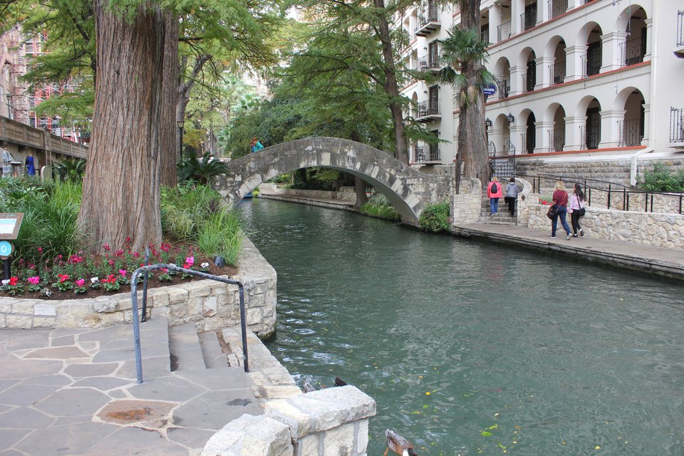 San Antonio River Walk beside a stone bridge